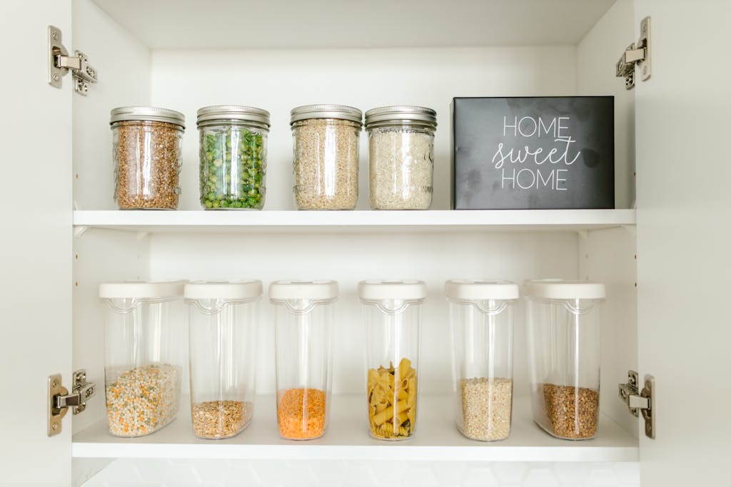 Neatly arranged food storage containers for simple kitchen organization.