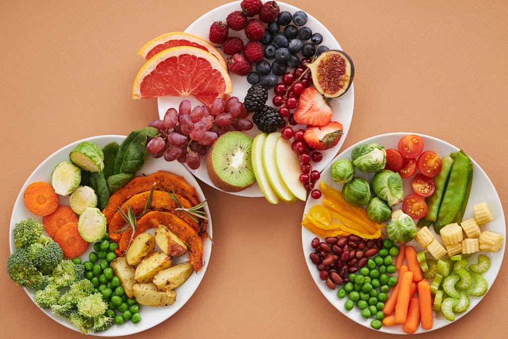 Vibrant plates of fresh fruits and vegetables, perfect for a healthy lifestyle and improve Gut Health.